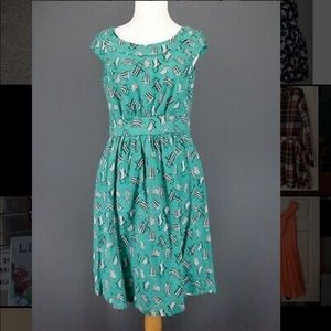 Emily and Fin Rachel dress in deck chairs